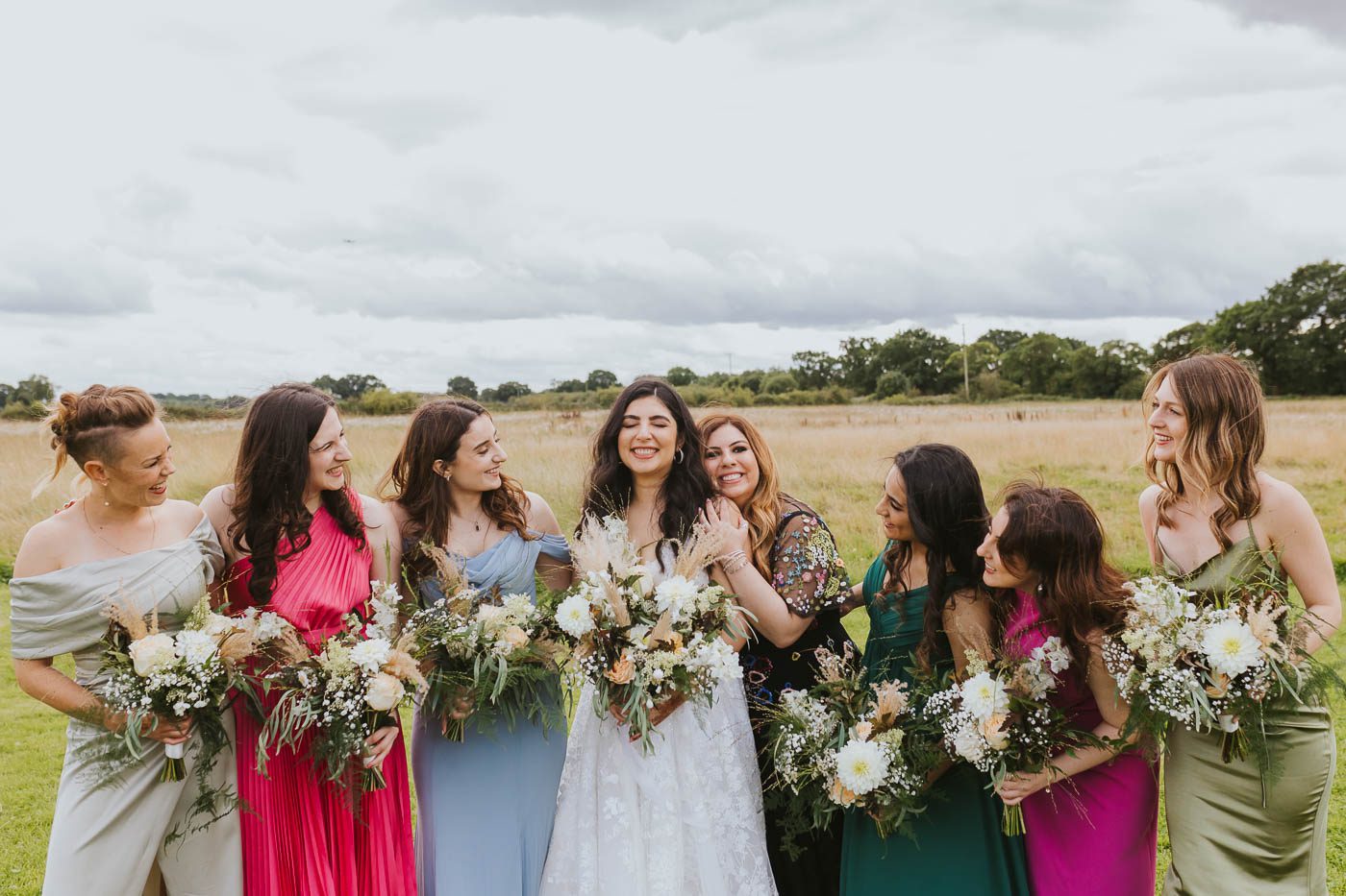 woodstock weddings photographer | photo of bride and bridesmaids with bouquets at woodstock weddings york | luxury barn wedding yorkshire