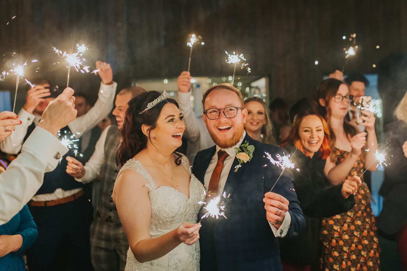 yorkshire wedding photos. bride and groom with sparklers at woodman inn